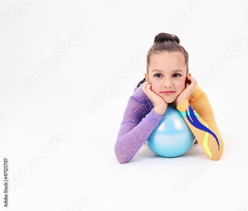 Beautiful flexible girl gymnast  over white background
