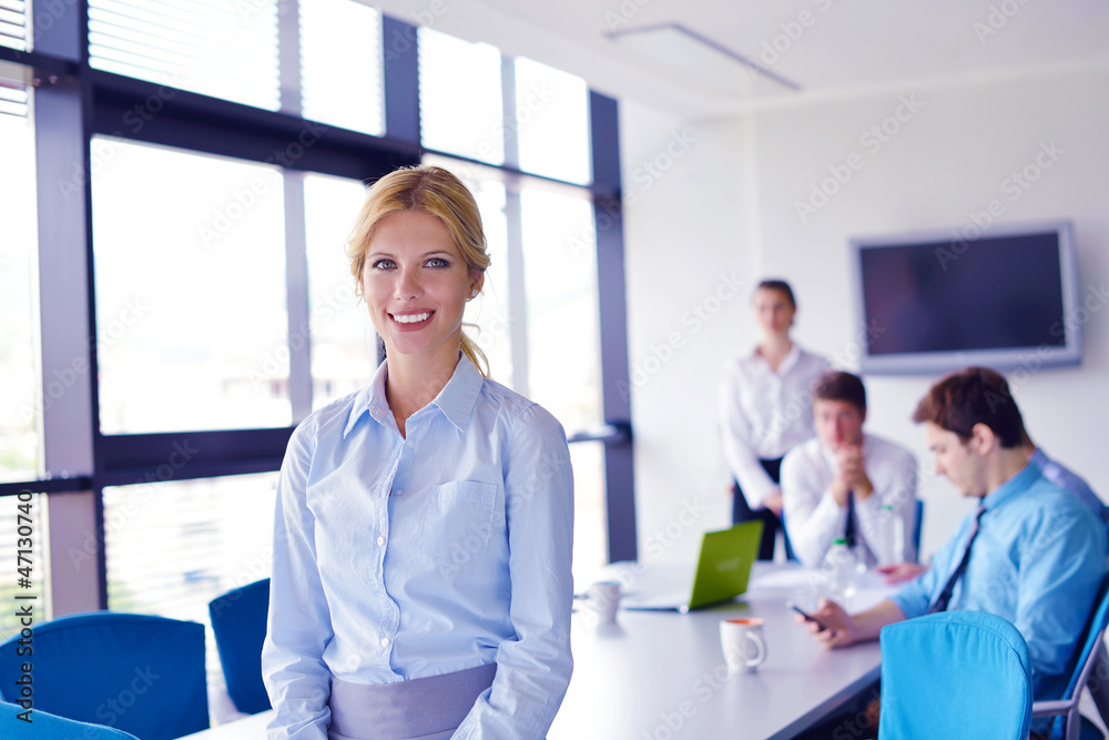 Group of happy young business people in a meeting at office Group of happy young business people in a meeting at office