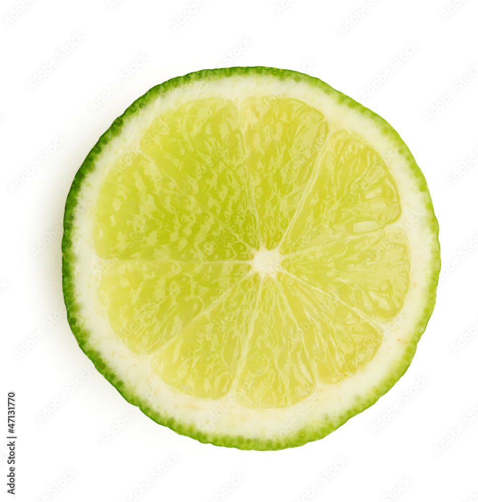 Slice of lime isolated on white
