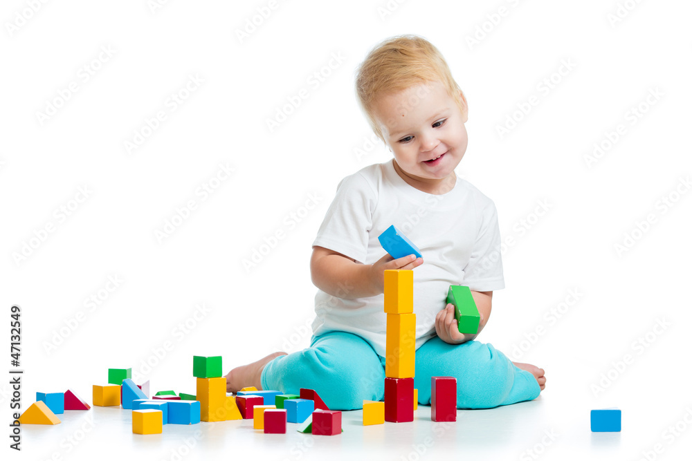 kid playing toy blocks isolated on white background kid playing toy blocks isolated on white background