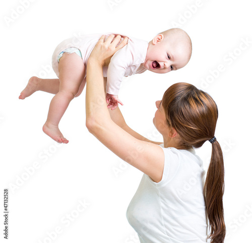 loving mother playing with ...