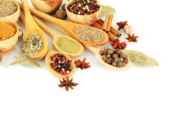 Fototapete Gewürze Assorted culinary spices and herbs in wooden spoons and bowls for cooking and flavoring dishes  © Africa Studio