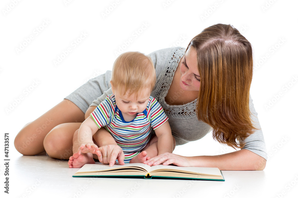 mother reading a book her baby boy mother reading a book her baby boy