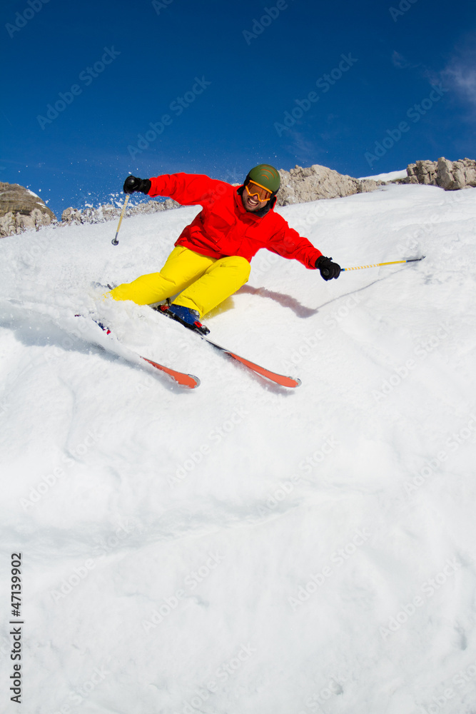 Skiing, Freeride - man skiing downhill