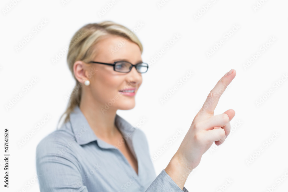 Standing businesswoman is showing something Standing businesswoman is showing something
