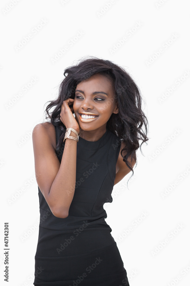 Fototapeta premium Woman with gold lips and black dress