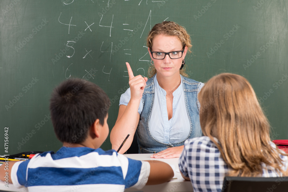 Strenge Lehrerin Im Schulunterricht Stock Foto Adobe Stock Strenge Lehrerin Im Schulunterricht Stock Foto Adobe Stock