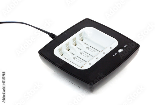 Empty NI-MH batteries charger on white background