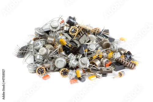 Old radio components on white background