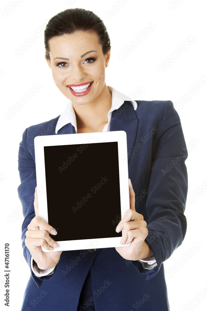 Business woman holding tablet PC with touch pad. Business woman holding tablet PC with touch pad.
