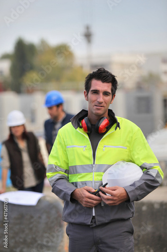 Foreman surveying construction photo