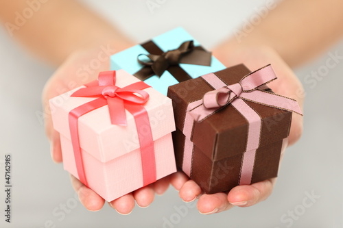 Woman holding Christmas gifts