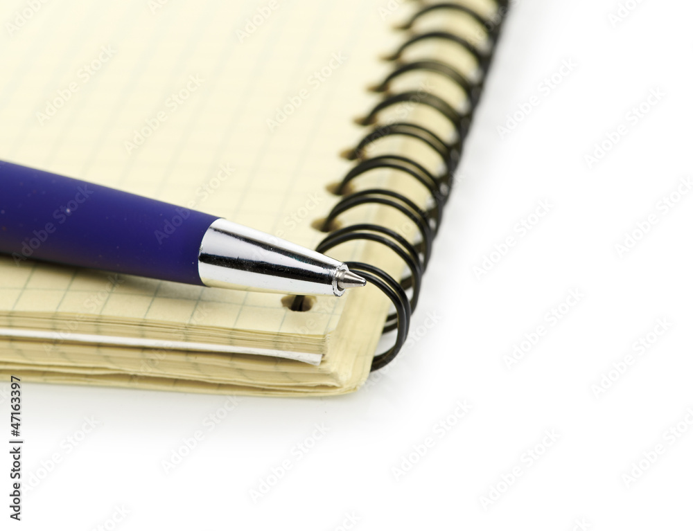 notepad and pen isolated on white background notepad and pen isolated on white background