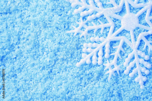 Snowflake in snow