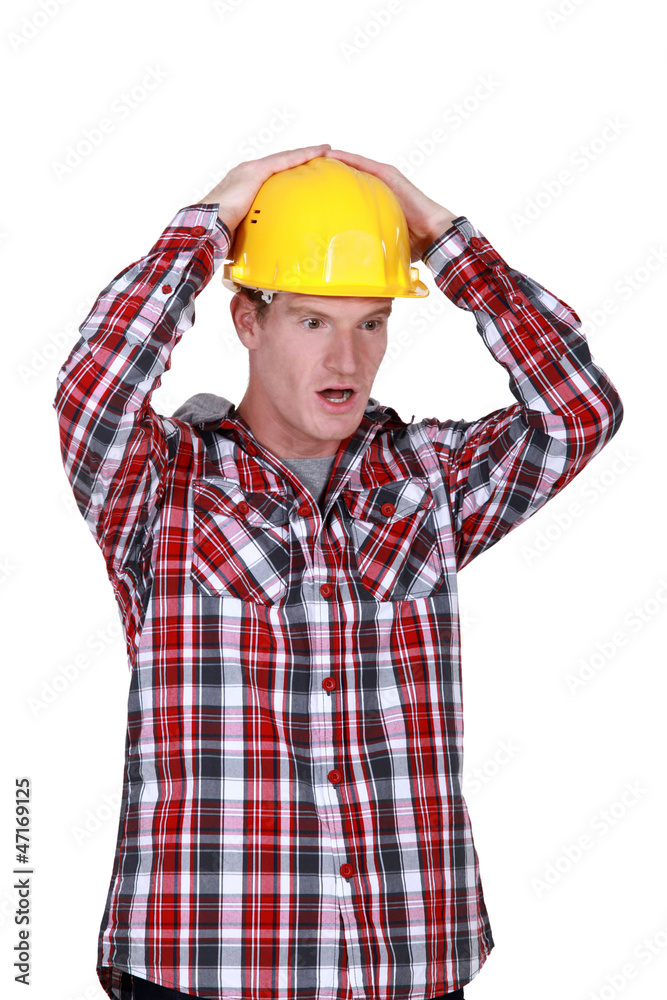 Shocked construction worker