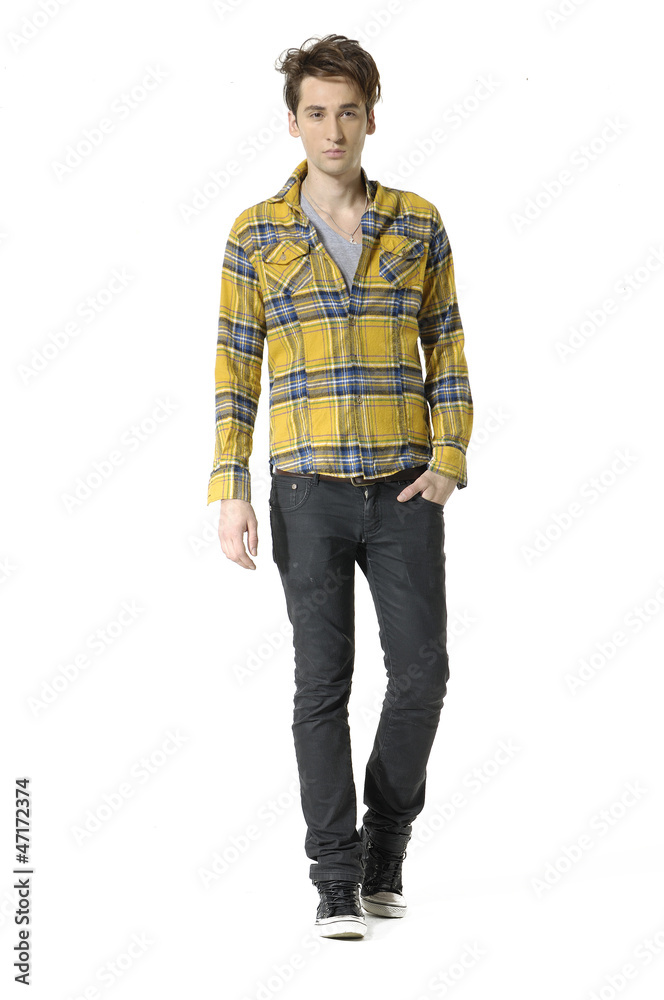 Full length nice portrait of young man walking posing Full length nice portrait of young man walking posing