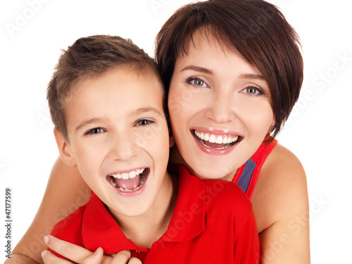 laughing young mother with son 8 year old photo