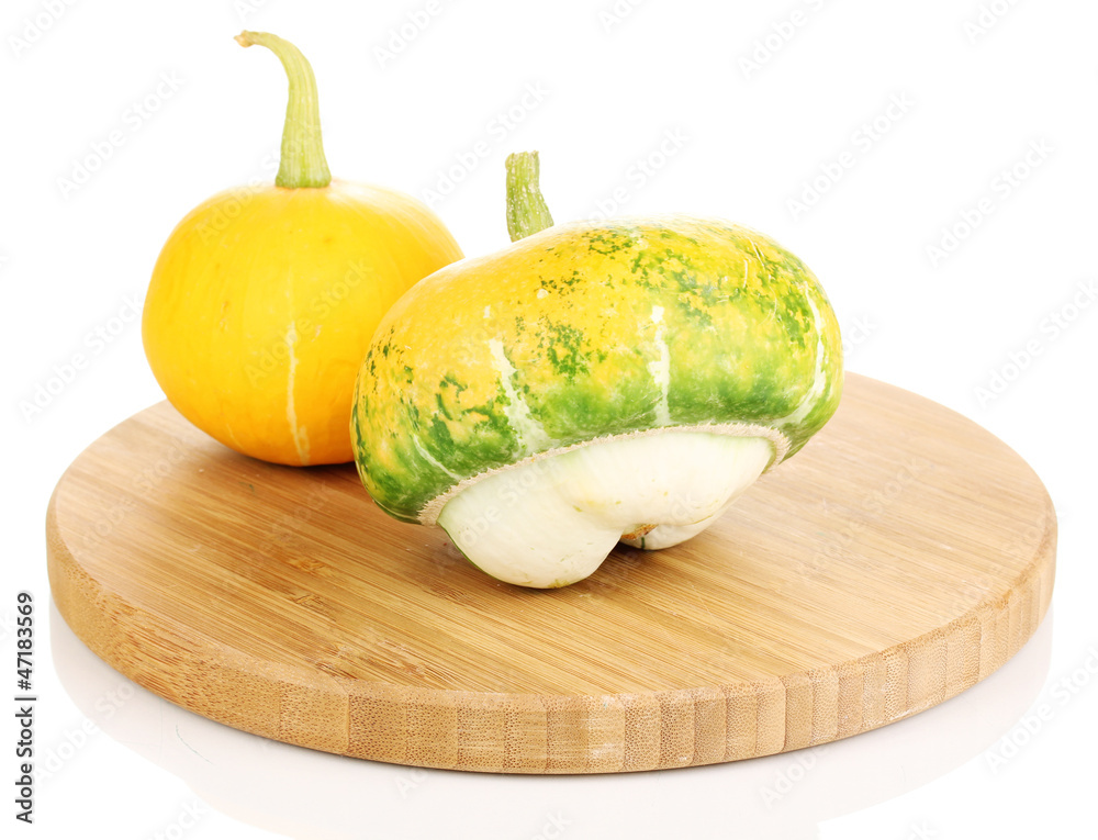 two pumpkins on wooden board isolated on white two pumpkins on wooden board isolated on white
