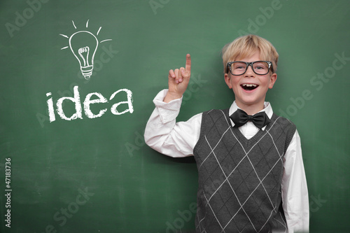 Schoolboy at the Blackboard with Idea