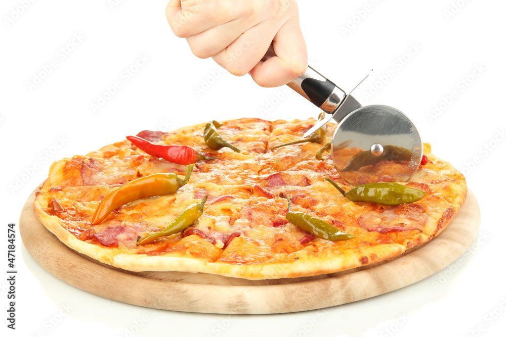 cutting tasty pepperoni pizza on wooden stand isolated on white