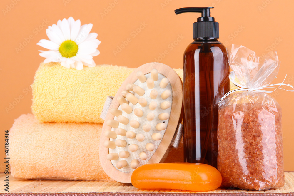 Set for care of a body on peach background Set for care of a body on peach background