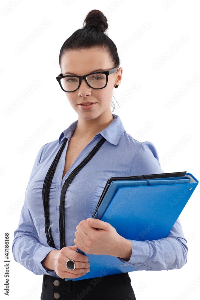 Portrait of secretary with folders