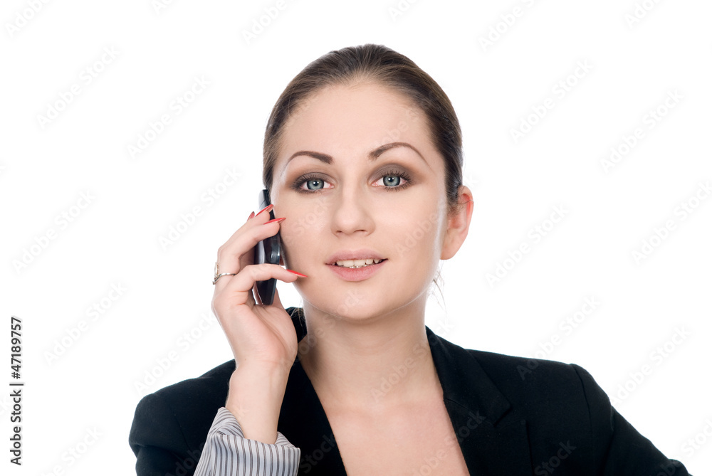 Happy businesswoman concentrating on cellphone call Happy businesswoman concentrating on cellphone call