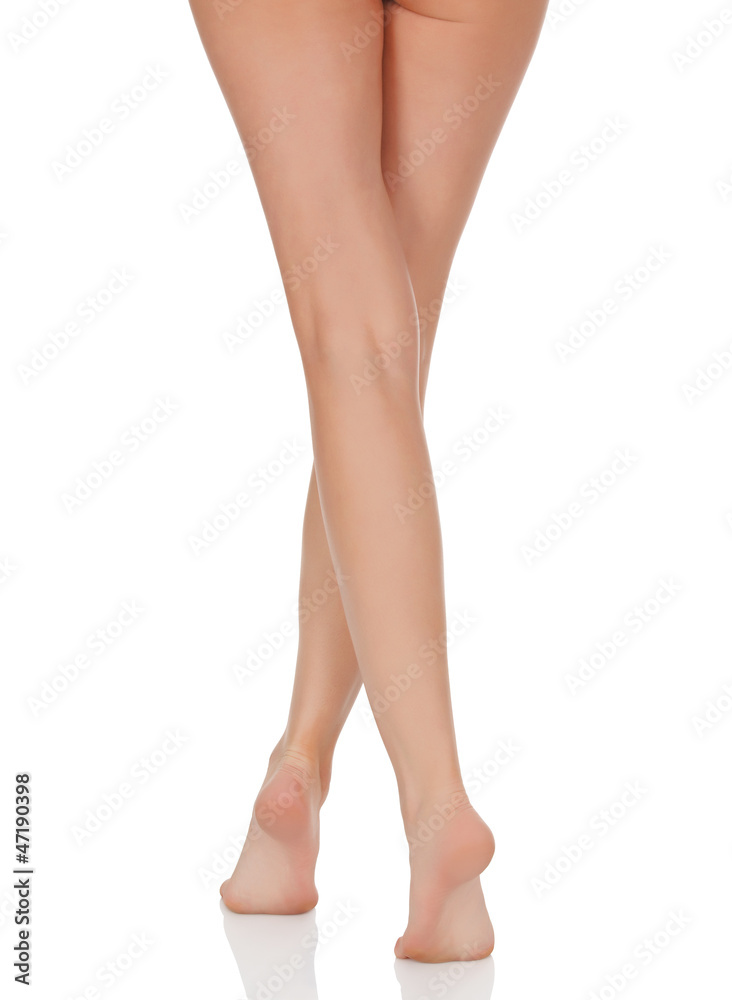 Female legs with pink heels isolated on white background Female legs with pink heels isolated on white background