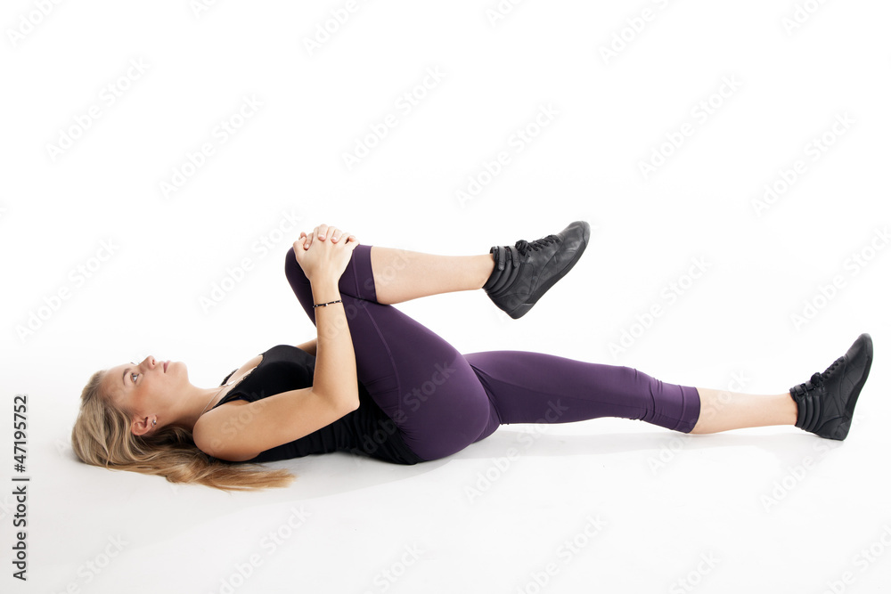 Junge Frau beim Stretching