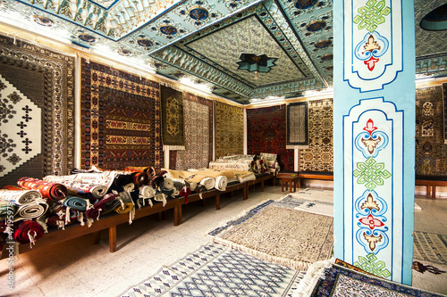Traditional carpet shop in Kairouan, Tunisia photo