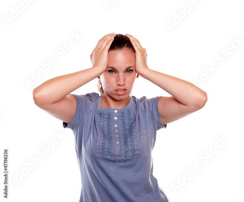 Unhappy young woman with a terrible headache © pablocalvog