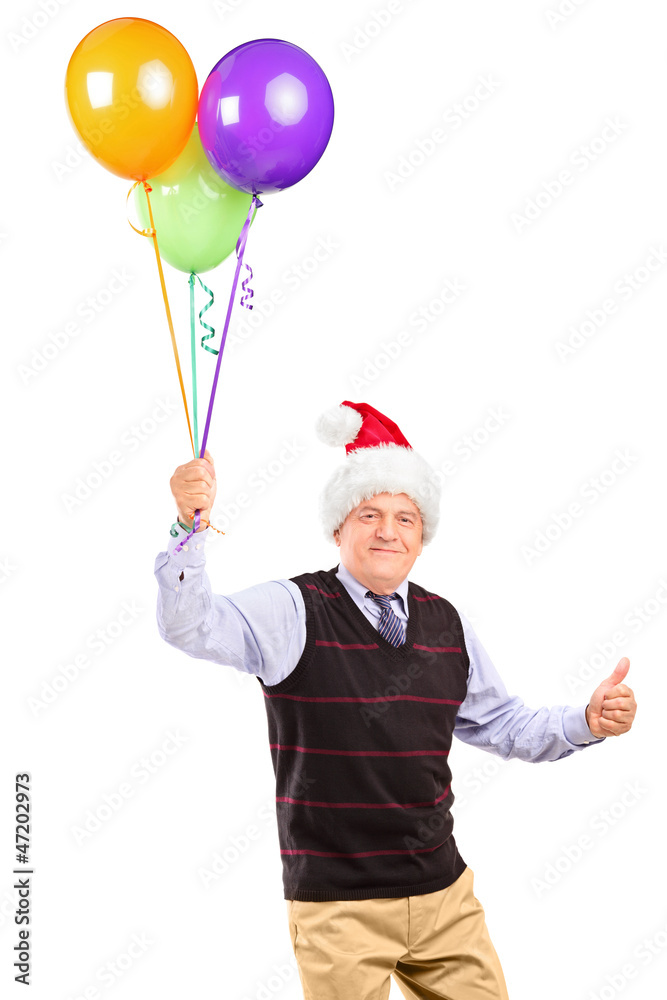 Gentleman with hat holding balloons and giving thumb up Gentleman with hat holding balloons and giving thumb up