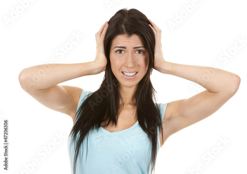 woman covering ears