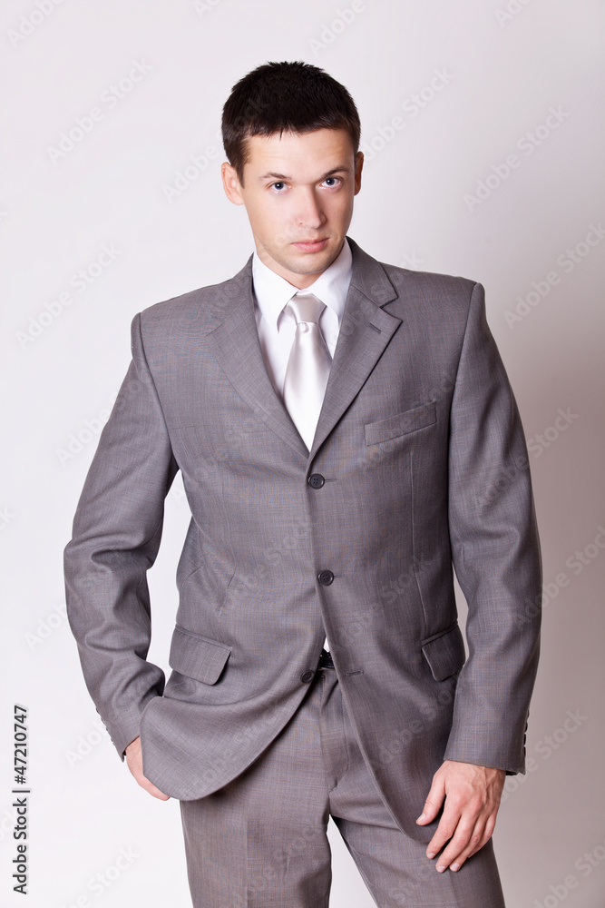Fototapeta premium portrait handsome man in grey suit