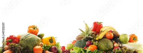 A pile of fresh and tasty fruits and vegetables on white
