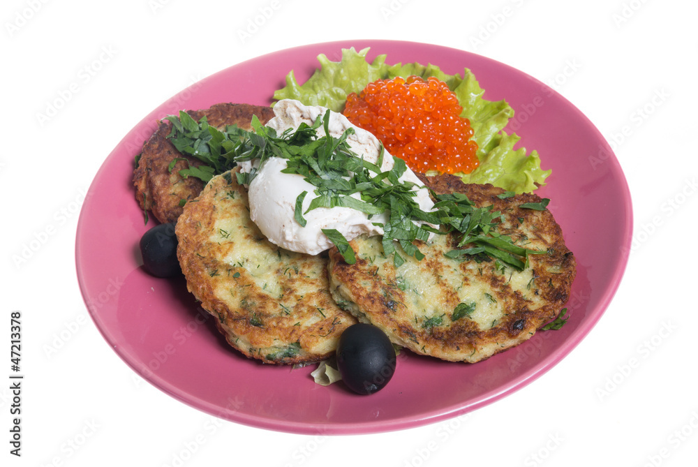 Roasted cutlets of potato with salmon on a plate Roasted cutlets of potato with salmon on a plate