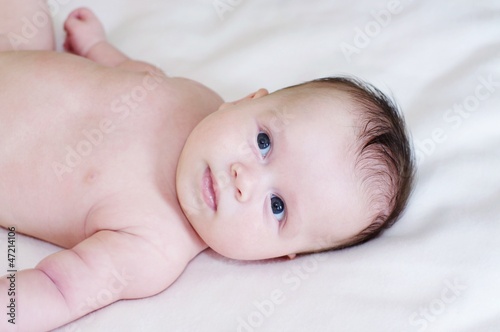 Portrait of the quiet undressed baby (2 months)