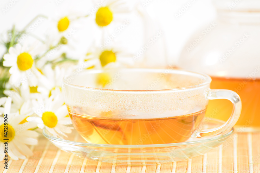 teacup with herbal chamomile tea teacup with herbal chamomile tea