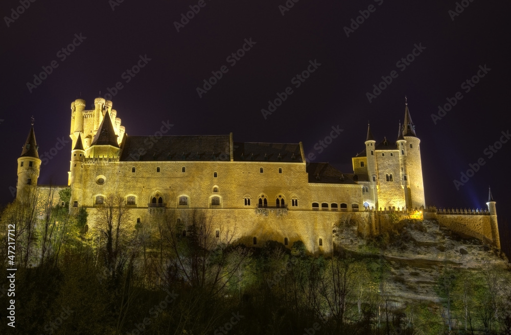 Segovia Alcazar Castle at night. Ancient Royal palace.