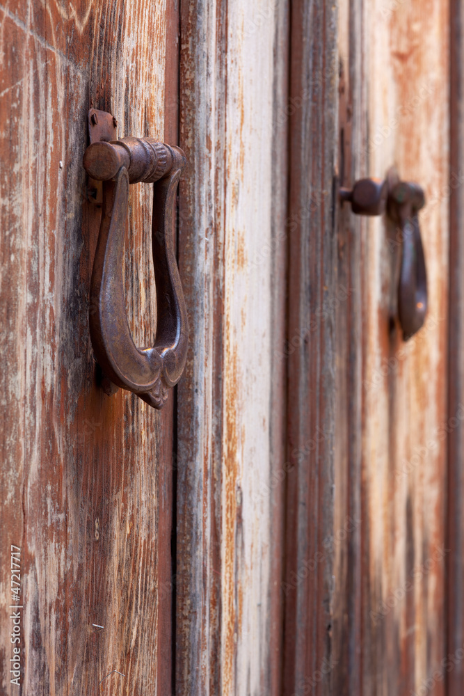 Two old door knockers, close-up