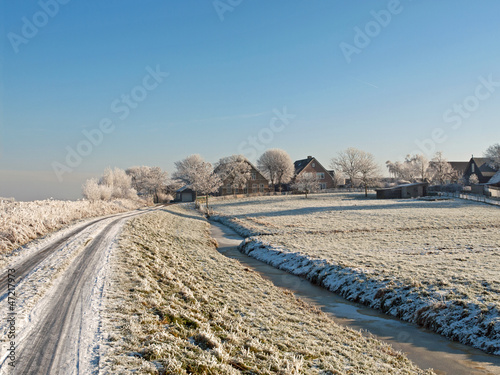 Winter landscape with farm in alblasserwaard, Netherlands