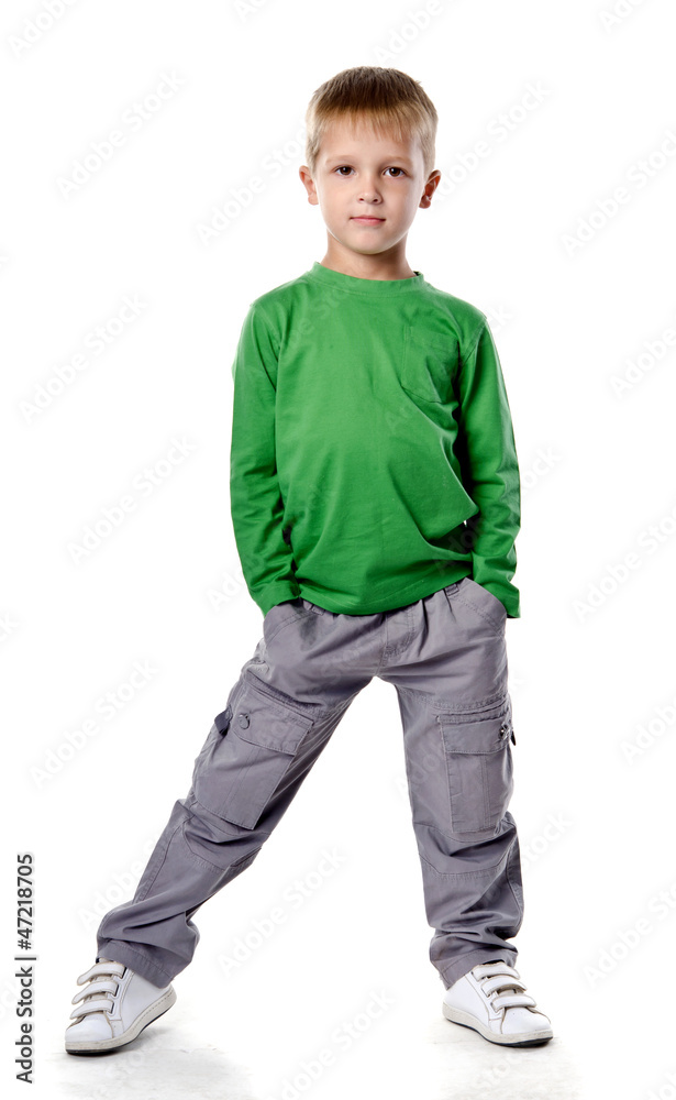 Full length portrait of a happy little boy standing isolated ove Full length portrait of a happy little boy standing isolated ove