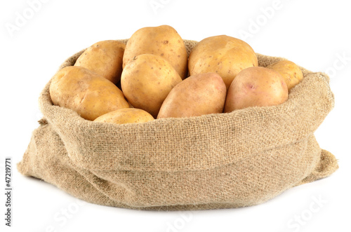 Potatoes in bag isolated on whtite photo