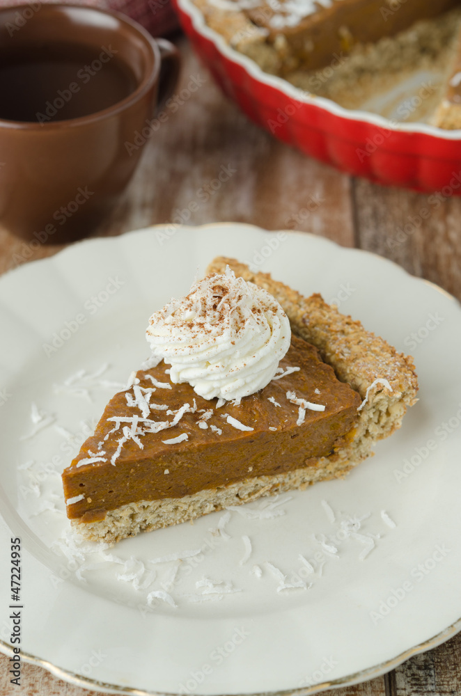Piece of cake with pumpkin and chocolate on a plate Piece of cake with pumpkin and chocolate on a plate