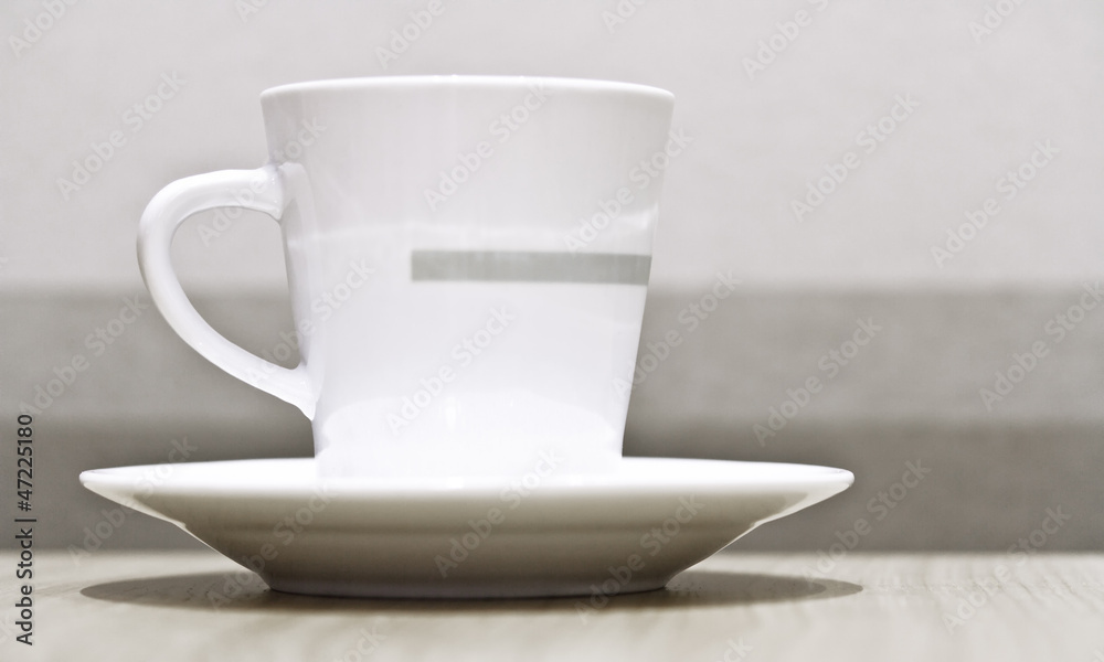 coffee cup against striped background