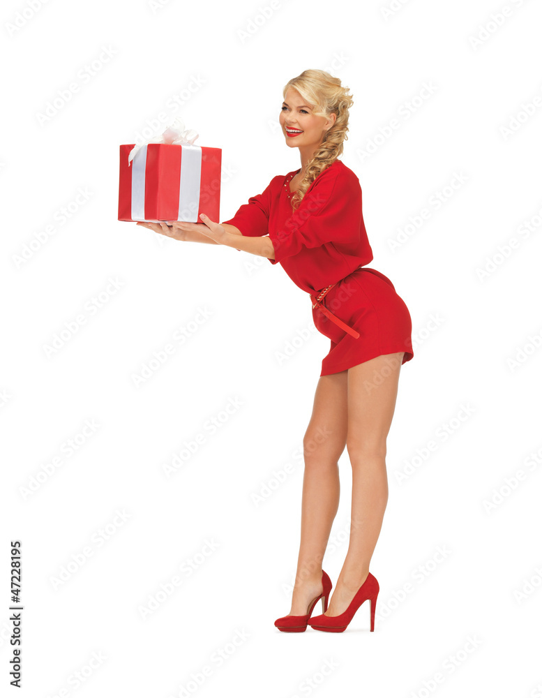 lovely woman in red dress with present lovely woman in red dress with present