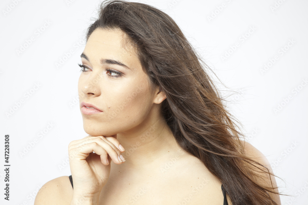 Fototapeta premium real beautiful young girl posing on white background
