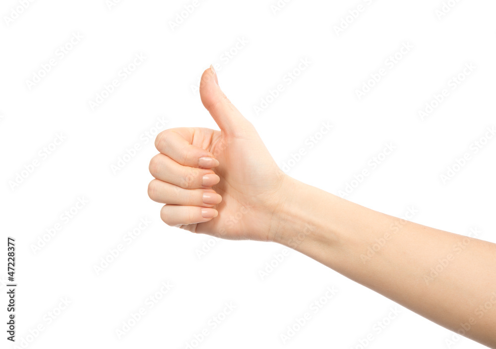 Beautiful woman hand thumb up with manucure nails Beautiful woman hand thumb up with manucure nails