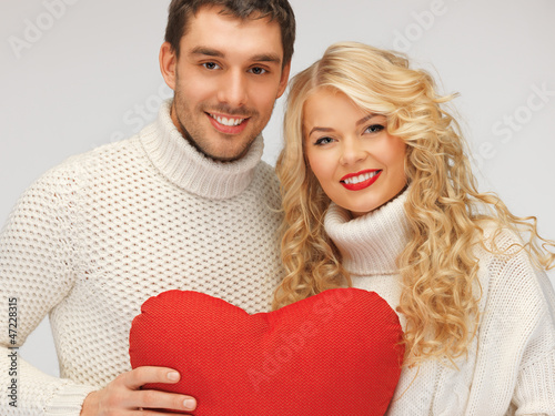 family couple in a sweaters with heart photo