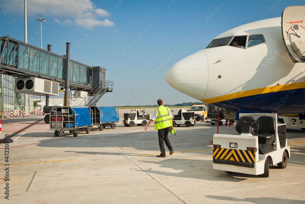 Fototapeta premium airport stuff and airplane